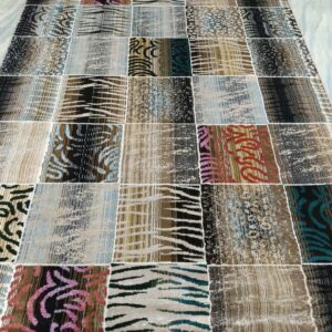 Safari Mosaic – 6x9 Ft Patchwork Rug in Beige, Black & Multi Accents