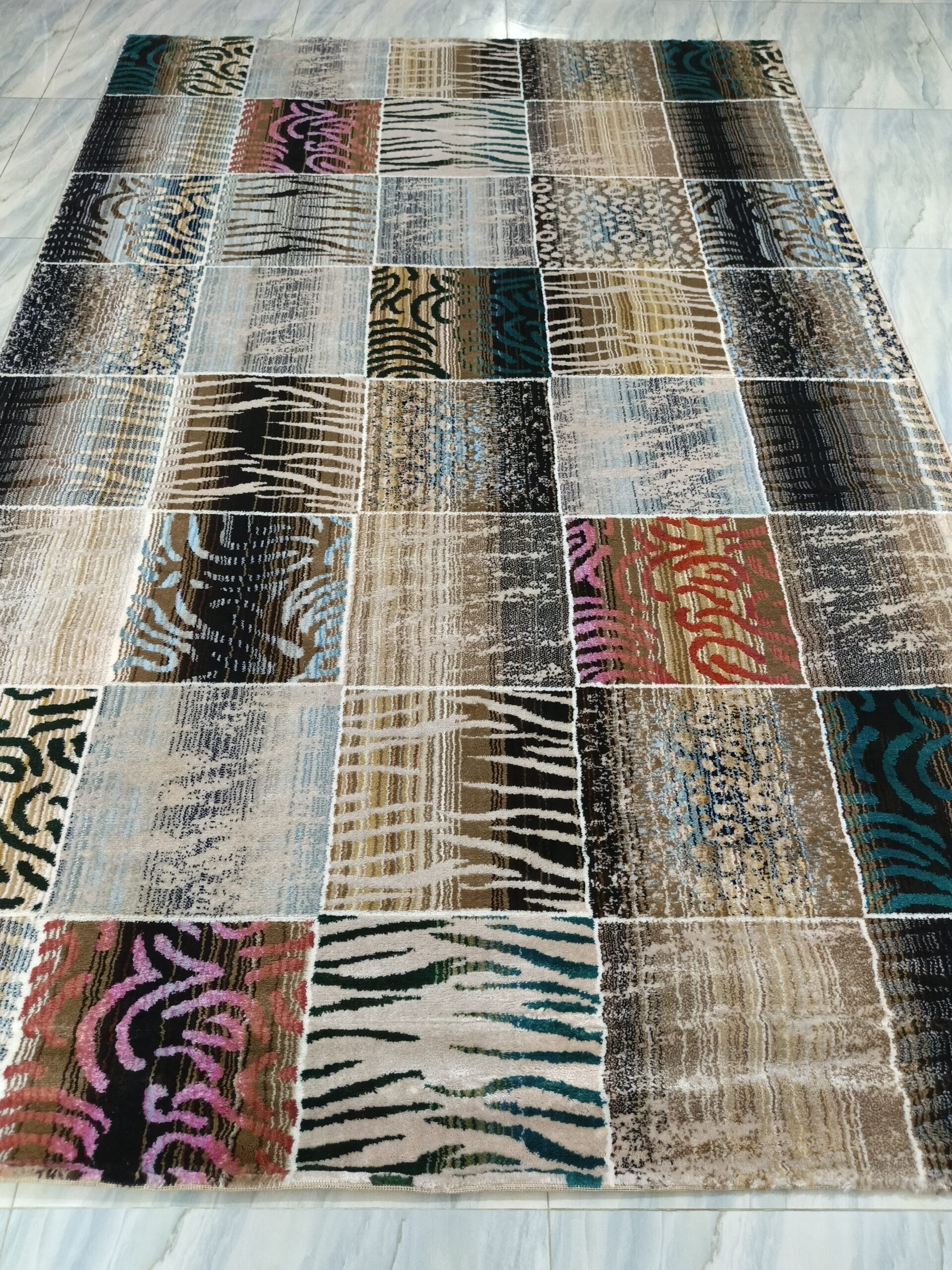 Safari Mosaic – 6x9 Ft Patchwork Rug in Beige, Black & Multi Accents